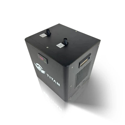 Titan cold plunge ice bath chiller, 3/4 view, black housing with digital temperature display, top inlet and outlet ports, side vent and handle