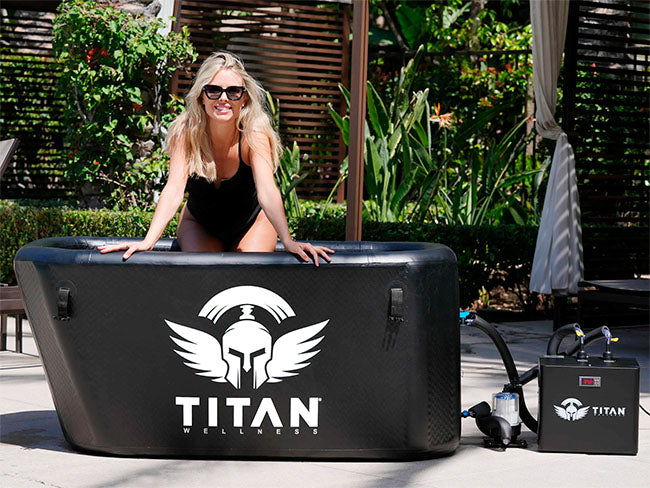 A person in Triumph Titan Cold Plunge System outside