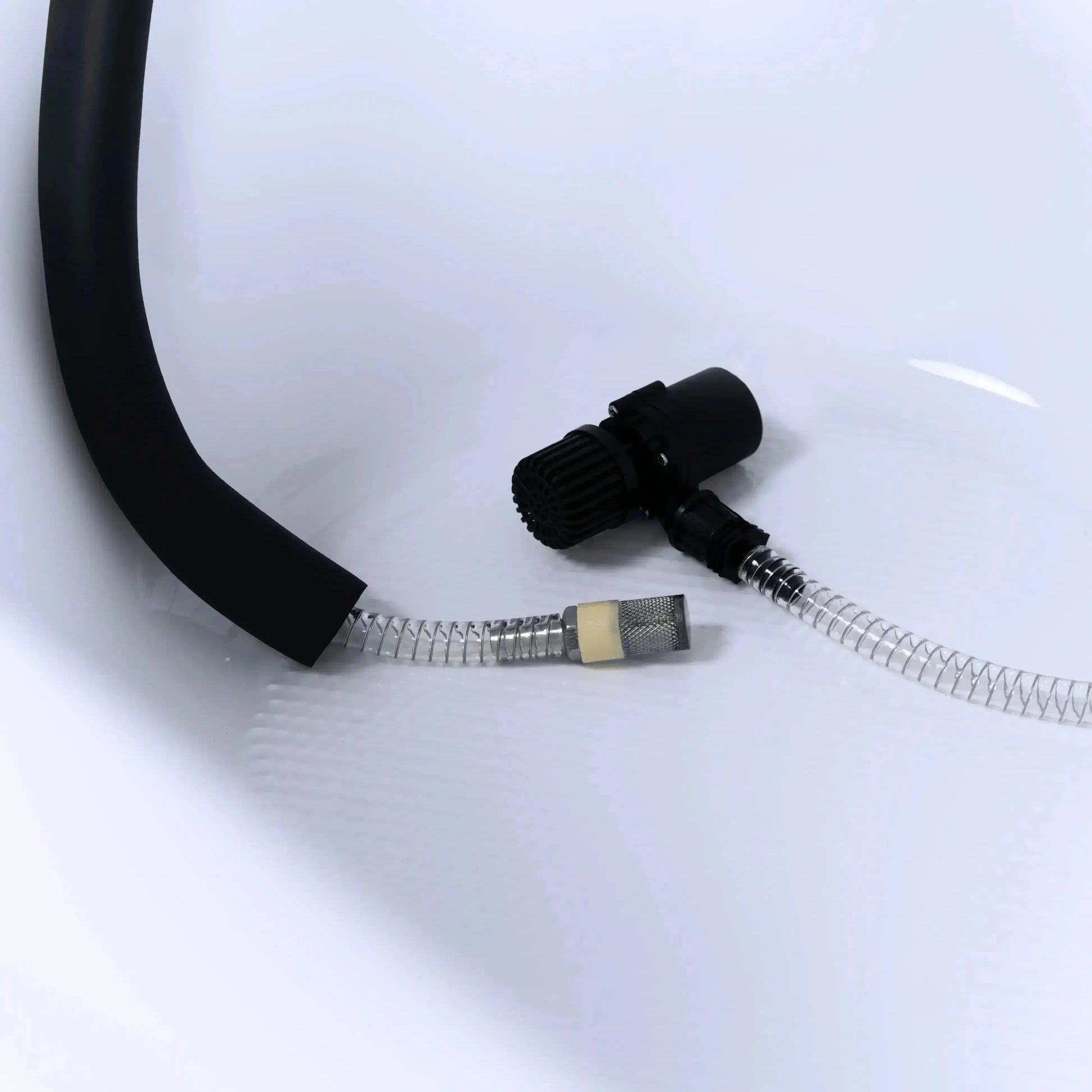 Titan Universal Ice Bath Chiller hoses inside cold plunge tub, submersible pump with intake strainer and stainless steel mesh return filter for water circulation