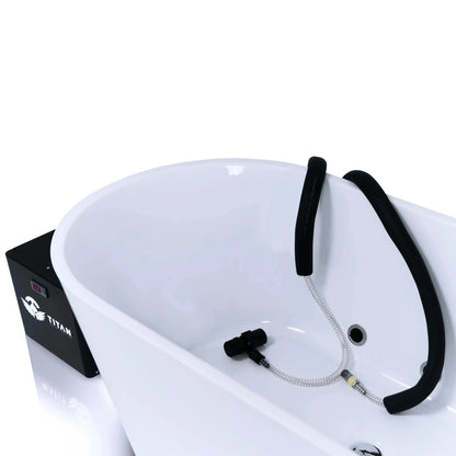 Titan Universal Ice Bath Chiller hoses inside freestanding bathtub, submersible pump and return filter connected to 1/3 HP unit