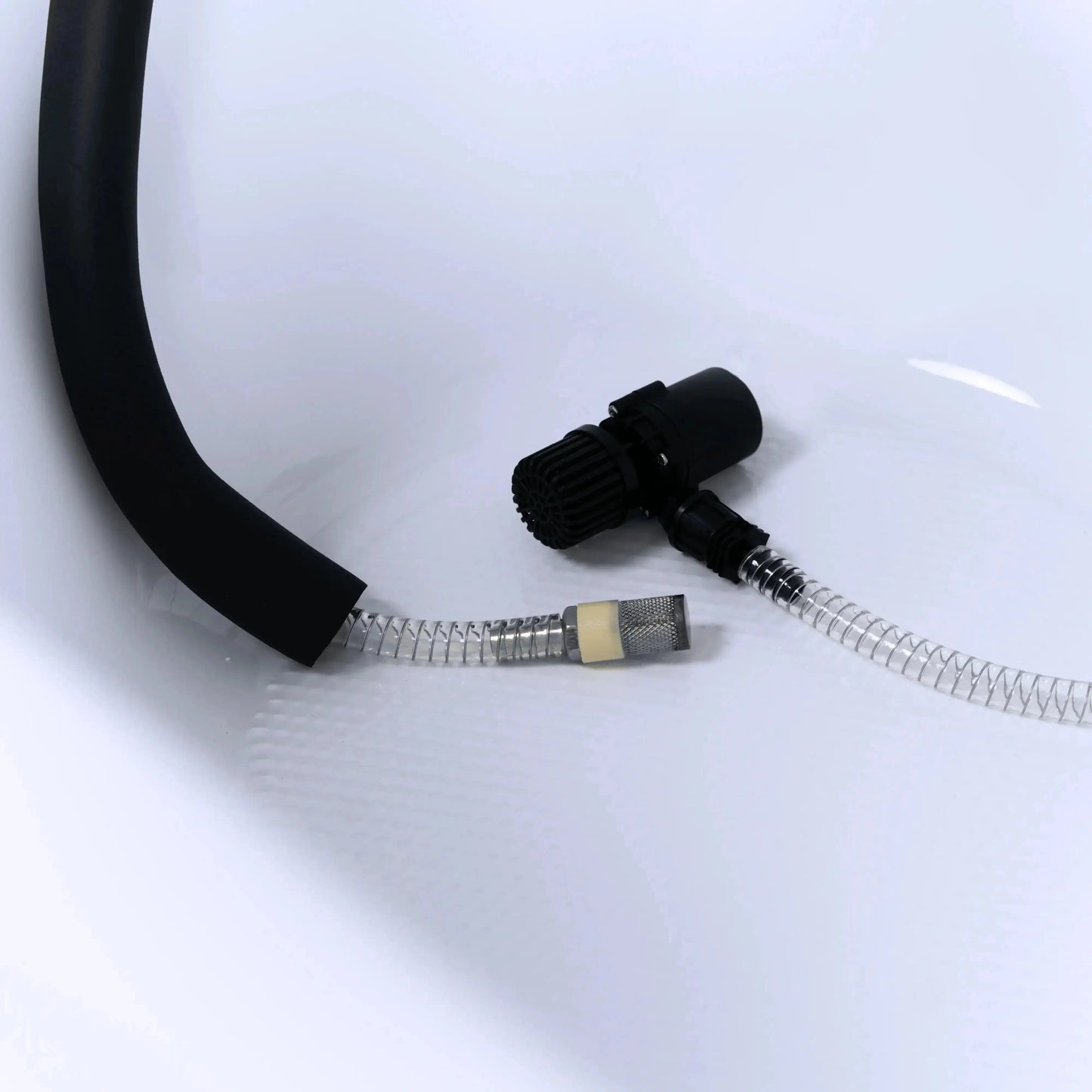 Titan Universal Ice Bath Chiller hoses inside cold plunge tub, submersible pump with intake strainer and stainless steel mesh return filter for water circulation